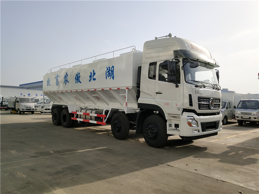 湖北傲農畜牧訂購程力集團東風天龍前四后八40立方（20噸）散裝飼料車